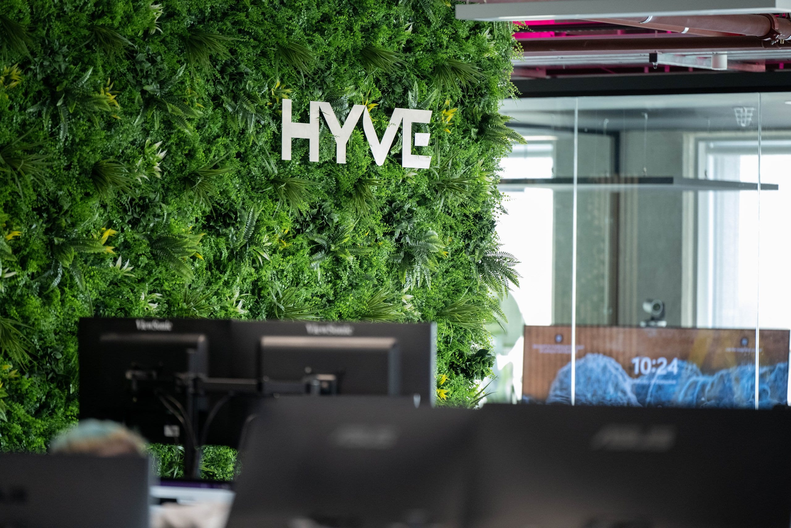 Hyve logo on a green living wall