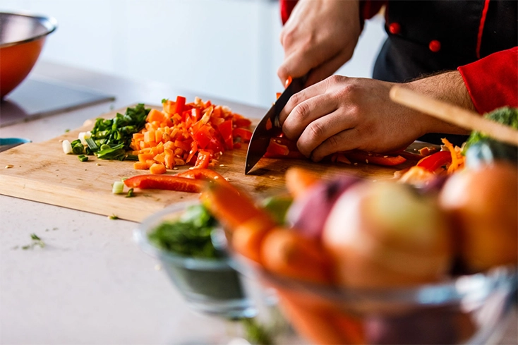 Chef cutting vegetables