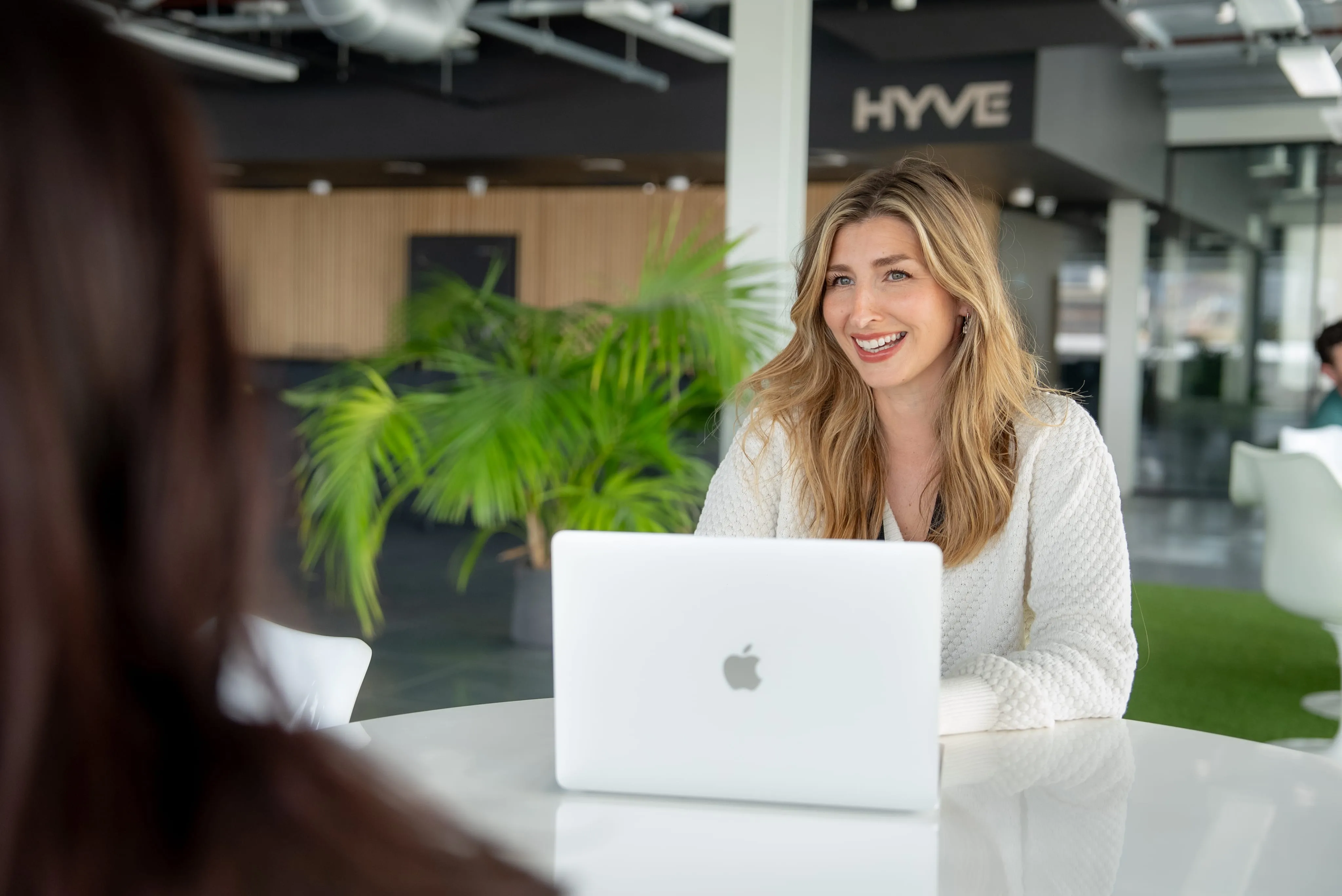 Hyve colleague smiling in an office