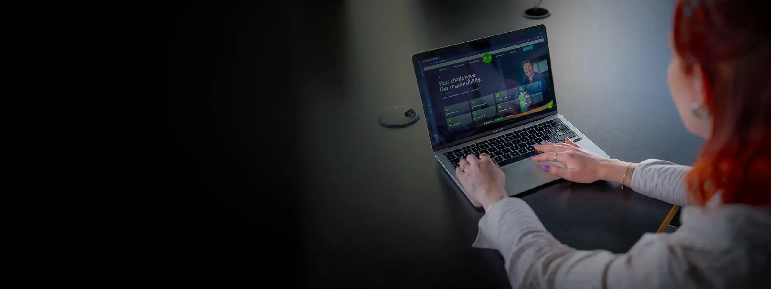 Person on a video call at a laptop