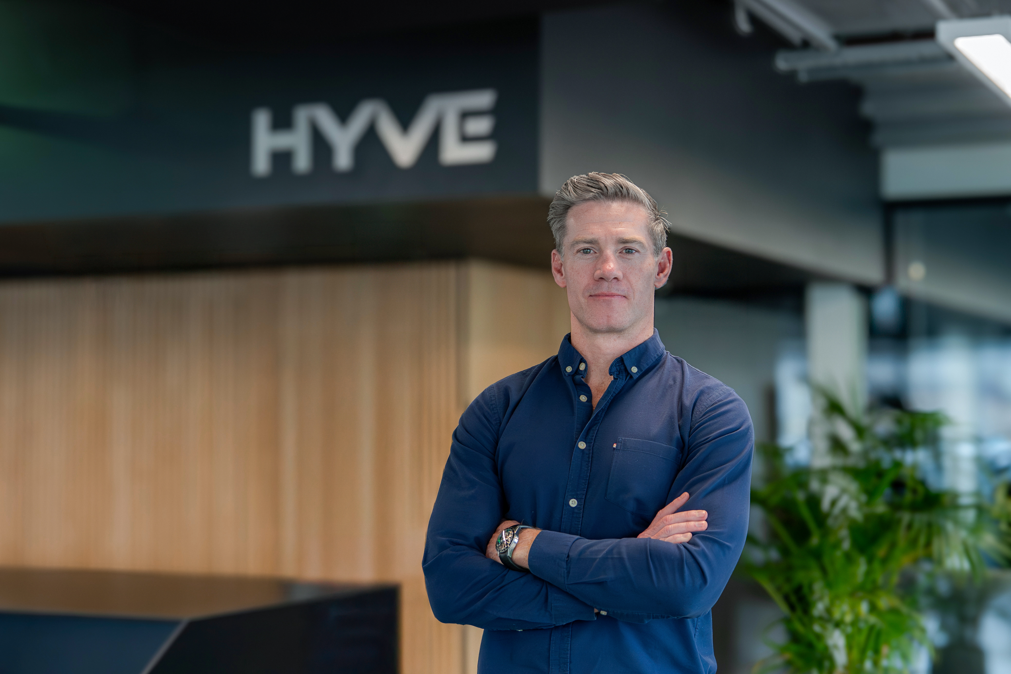 Hyve colleague standing in the office
