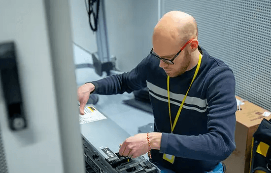 Engineer working on server hardware