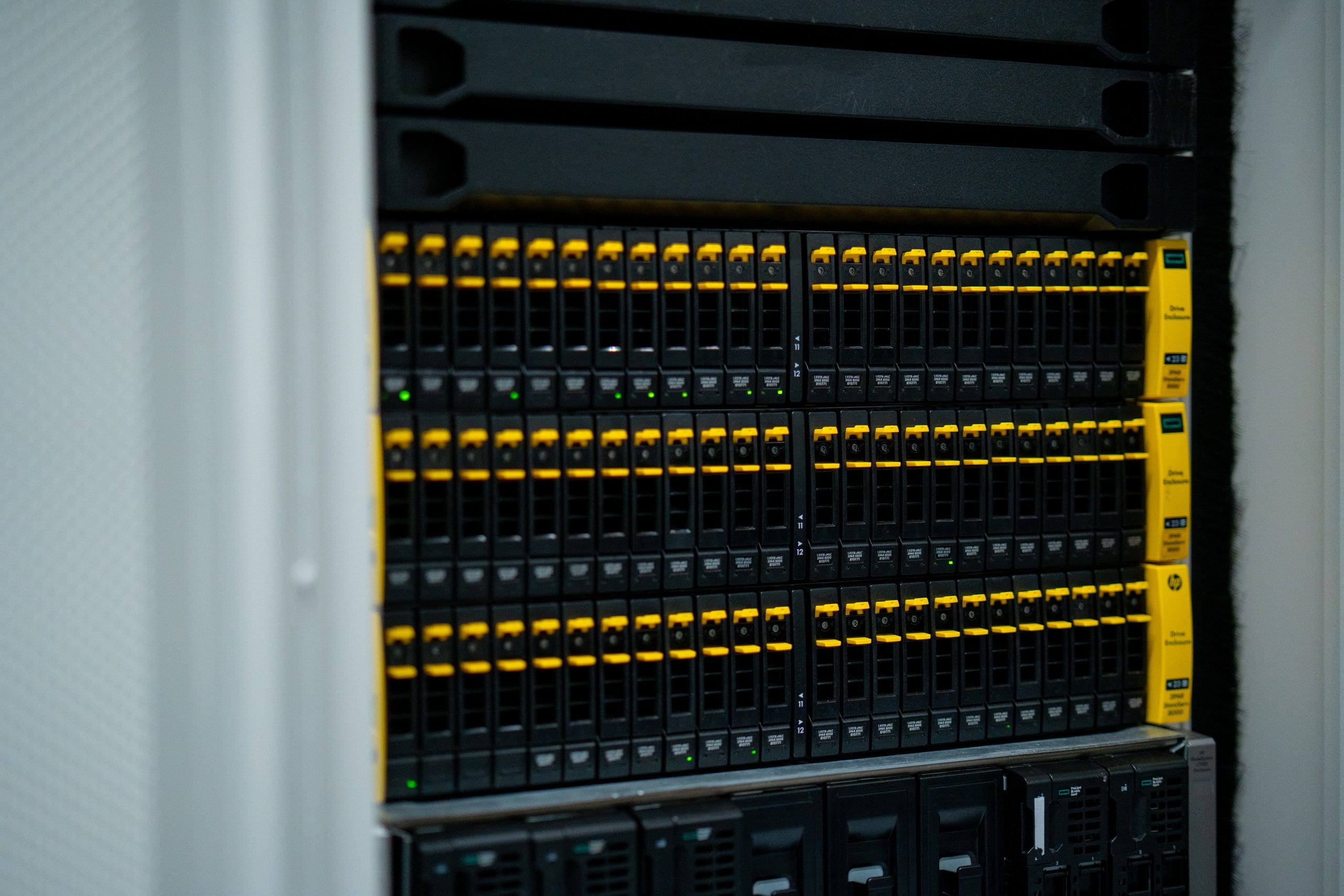 Yellow-handled storage array in a rack