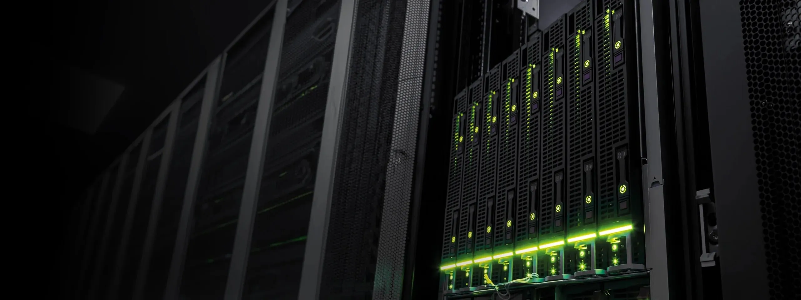Server rack with green status lights in a data centre