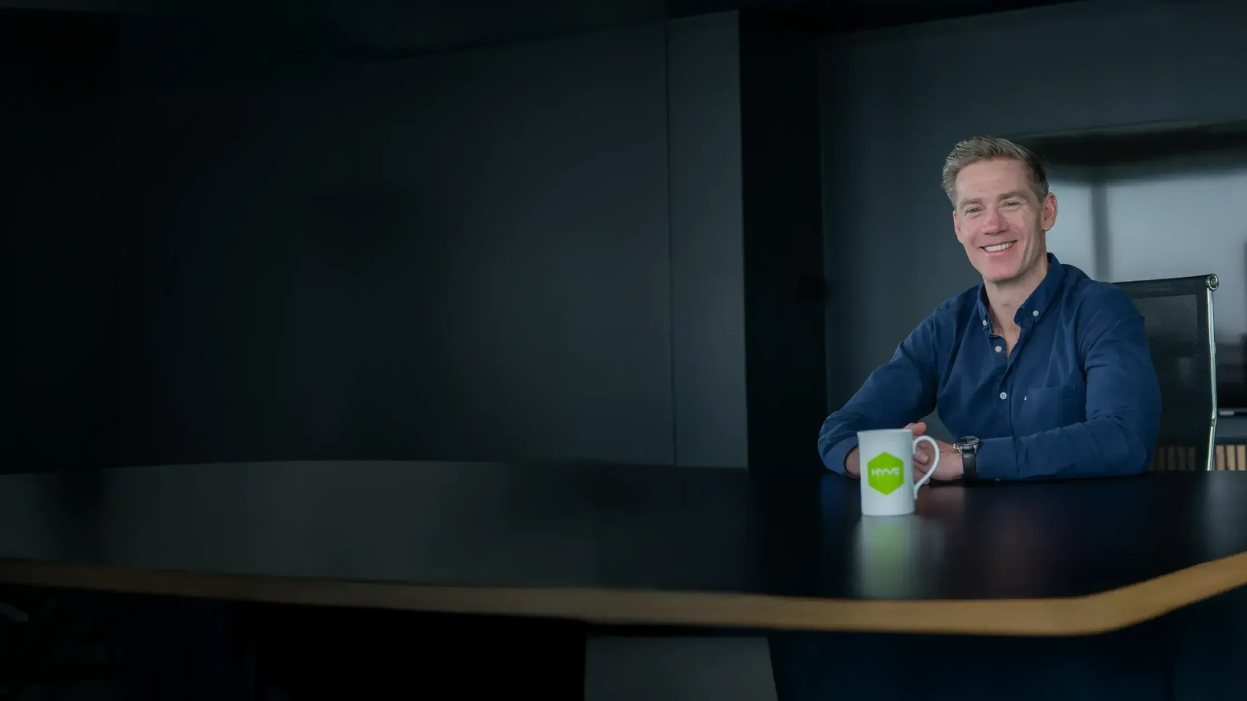 Cloud specialist at a meeting table