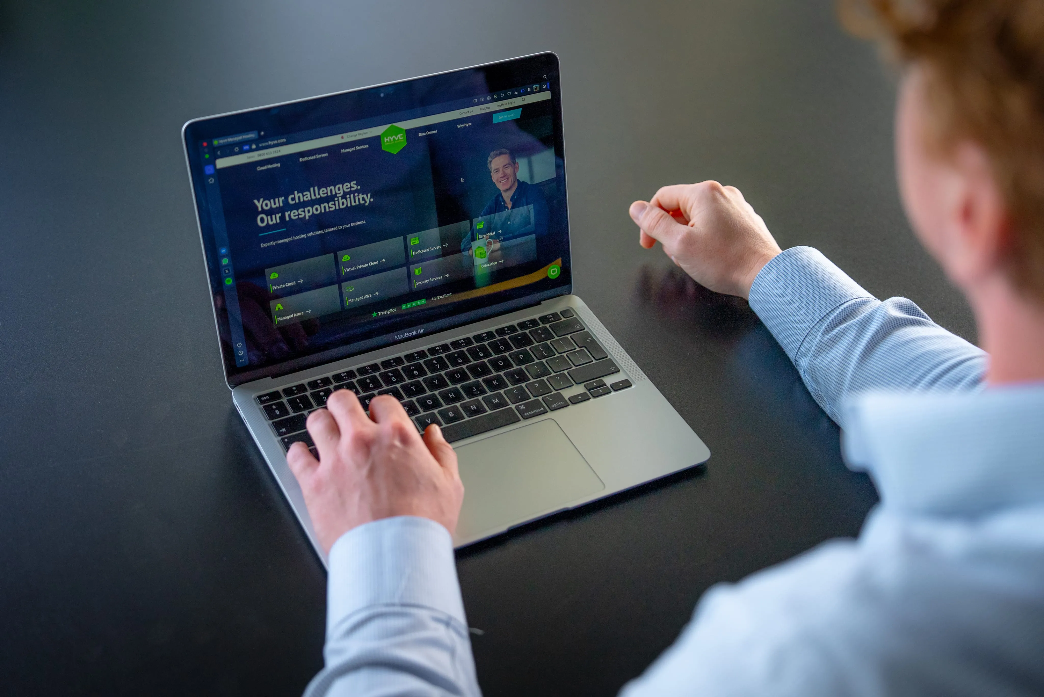 Person using a laptop showing the Hyve partner dashboard