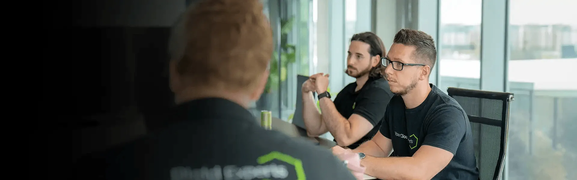 Two colleagues talking in an office