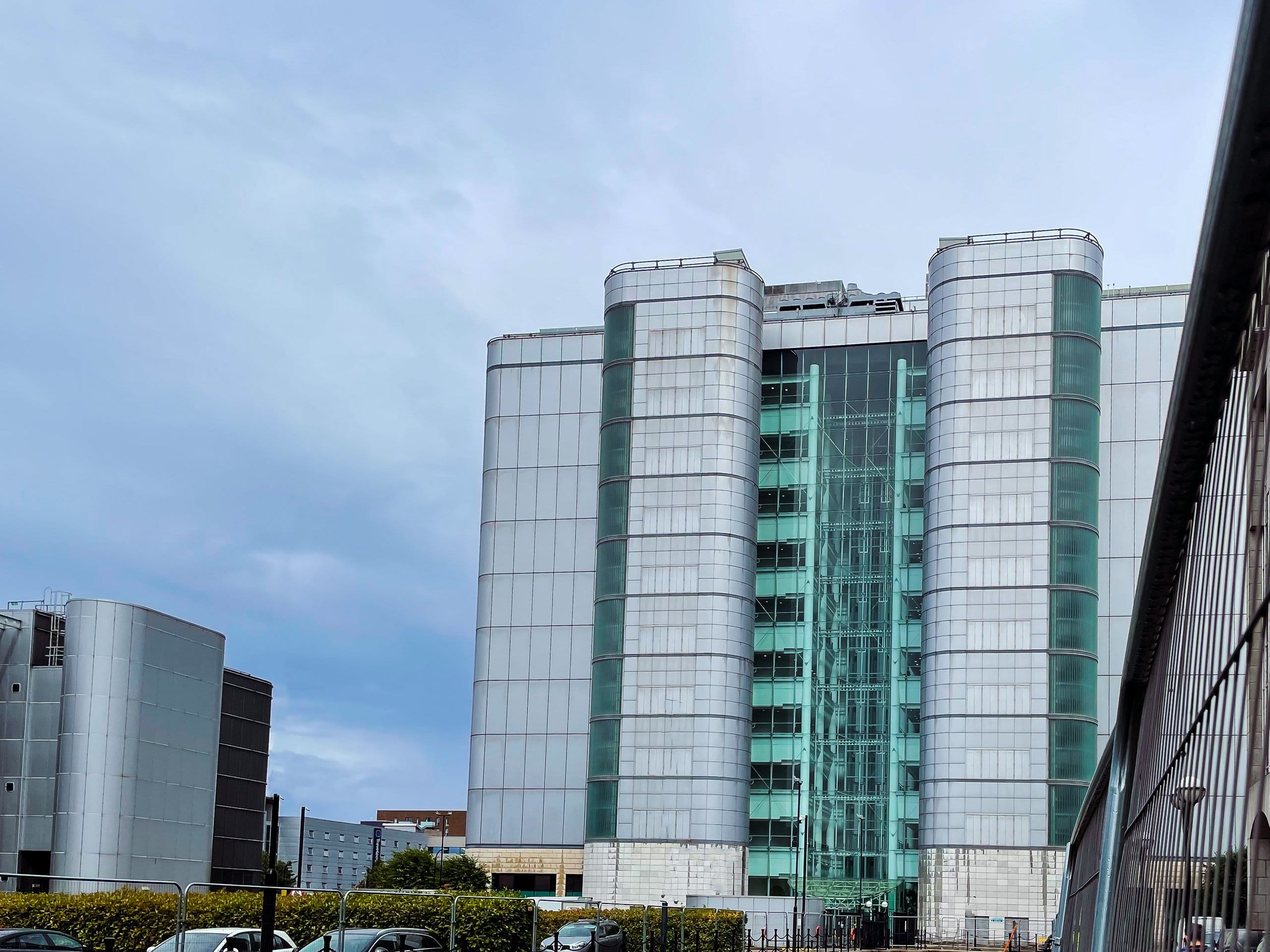 Glass office towers against a dark sky