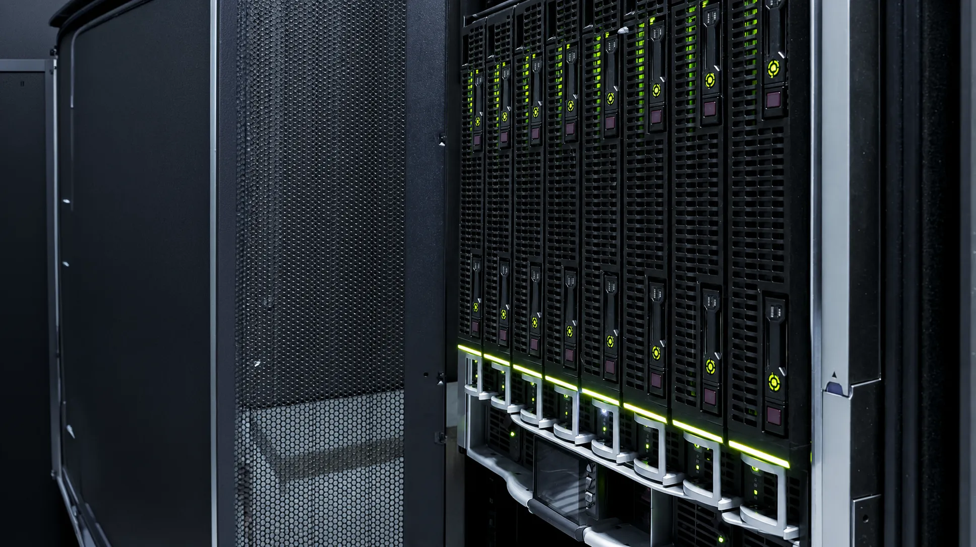 Green-lit server racks in a data center